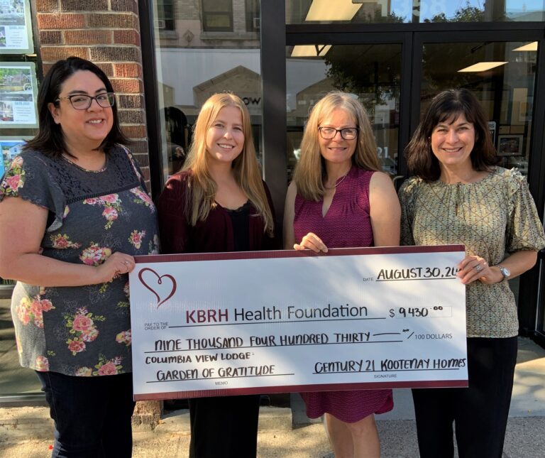 Lisa Pasin, Executive Director, has accepted this donation from Melannie Vockeroth, Century 21 Owner, and team members Jerika Perepolkin and Darby Profili.